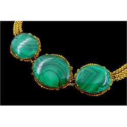Early 20th century 18ct gold malachite necklace, three oval malachites, with yellow gold beaded border, to an 18ct gold three strand chain necklace