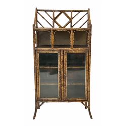Late Victorian bamboo side cabinet, inset bevelled mirror over shelves and two glazed doors