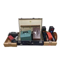 Vintage projector, three vintage cases, various plastic spools for film and other miscellaneous items