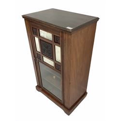 Edwardian walnut sheet music cabinet, the glazed door with floral carved panels and sectional bevel glazed mirrors enclosing four shelves 
