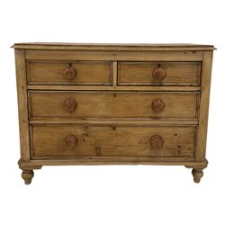 Victorian pine chest of drawers, the rectangular top with moulded edge over two short and two long drawers, raised on turned supports 