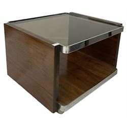 Contemporary coffee table, the smoked glass top over under-tier, raised on castors 