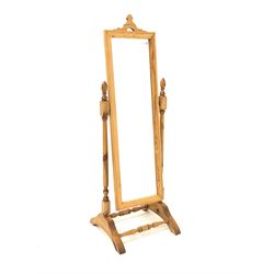 Solid pine cheval dressing mirror raised on turned uprights and sledge supports H142cm