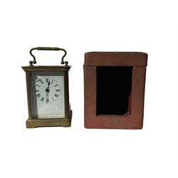 French- early 20th century timepiece carriage clock complete with original velvet lined traveling case, enamel dial with Roman numerals, minute markers and steel spade hands, corniche style case with an oval glass panel to the top, 8-day movement with a replacement jewelled lever platform escapement. With key.