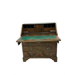 18th century walnut bureau, the fall front enclosing interior fitted with drawers and pigeon holes over four graduated drawers, raised on bracket feet 