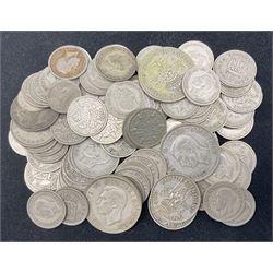Approximately 275 grams of pre-1947 Great British silver coins, including two shillings, sixpences etc