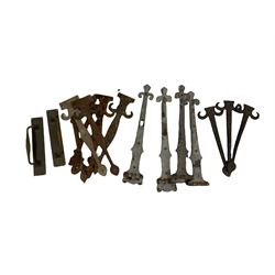 Collection of cast iron strap hinges, together with two cast brass pull handles 