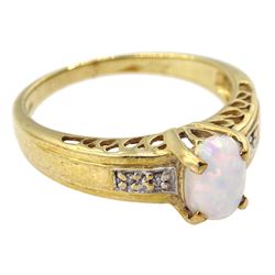 9ct gold oval opal ring with diamond set shoulders, hallmarked 