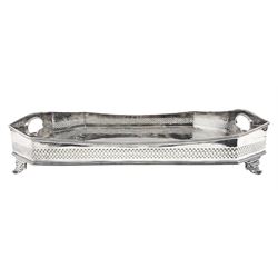 Early 20th century silver-plated tea tray by James Deakin & Sons, Sheffield, rectangular canted form with ornate engraved decoration, pierced gallery rail and shaped handles, L58cm x W40cm 
