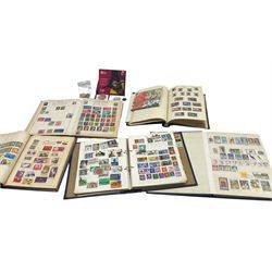 Five stamp albums and contents of GB and World stamps and a few coins 