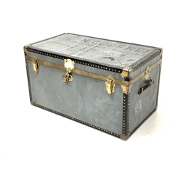 Early 20th century leather and brass bound tin travelling trunk, bearing the name 'K. Godfrey'