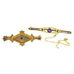 Early 20th century amethyst brooch, stamped 15ct and a gold stone set brooch, stamped 9ct
