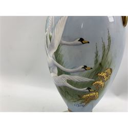 20th century twin handled vase by F. Clark, of ovoid form, hand painted with three swans in flight after Charles Baldwyn, signed by F. Clark a former Worcester artist, H24.5cm 