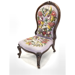  19th century walnut nursing chair with acanthus carved cresting rail over floral embroidered and bead work seat and back panel, raised on carved cabriole supports and ceramic castors, W54cm  