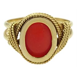 Gold single stone coral ring, in rope twist setting