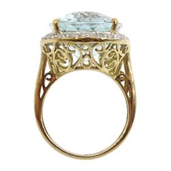 9ct gold large oval blue topaz and diamond cluster ring, hallmarked