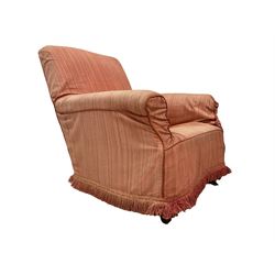 Early 20th century walnut framed armchair, upholstered in gold damask fabric with sprung back and seat, raised on square tapering supports, covered in removable coral chair cover