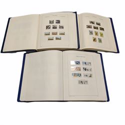 Queen Elizabeth II mint decimal stamps, housed in three albums, face value of usable postage approximately 480 GBP