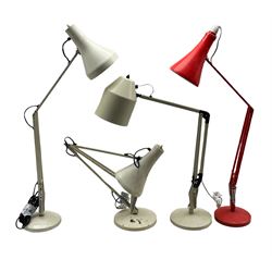 Two Herbert Terry & Sons Anglepoise lamps in red and cream, together with two similar Anglepoise lamps (4)