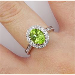 Silver oval peridot and cubic zirconia ring, stamped 925 