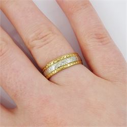 18ct white and yellow wedding band, with engraved decoration, Birmingham 1936 