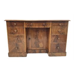 Early 20th century mahogany knee hole desk, the rectangular top with moulded edge over three short drawers, over six graduated drawers flanking one central cupboard W130cm, H79cm. D63cm