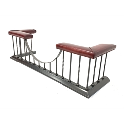 Victorian style wrought metal club fender, with two leather upholstered seats to each end, W180cm, H55cm, D56cm