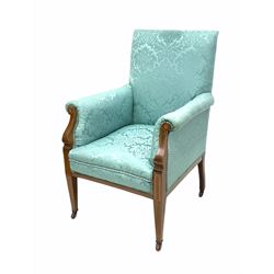 Edwardian mahogany armchair, the show frame with boxwood and satinwood inlay, upholstered in blue floral damask silk, raised on square tapered supports with brass and ceramic castors W68cm