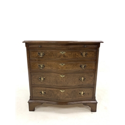 Georgian style walnut serpentine fronted chest, with brushing slide over four graduated drawers enclosed by canted and fluted corners, raised on bracket supports, W76cm, H78cm, D47cm