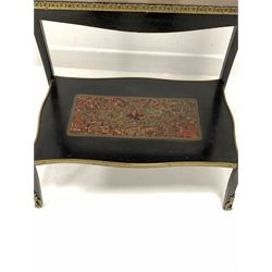 Late 19th / early 20th century French boulle and ebonised rosewood bijouterie table, the hinged top with bevelled glass plate and floral cast ormolu mounted lifting to reveal velvet lined interior, raised on shaped slender supports united by under tier, terminating in sabot feet 62cm x 42cm, H77cm