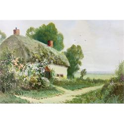Reginald Daniel Sherrin (British 1891-1971): Thatched Roof Cottages with Spring Flowers, pair watercolours signed together with English School (early 20th century): The Boathouse, oil on board indistinctly signed max 24cm x 36cm (3)
