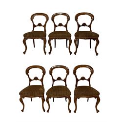 Set six Victorian mahogany dining chairs, the carved cresting and back rail over upholstered seat, raised on cabriole supports 