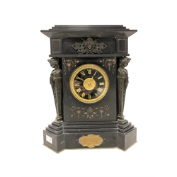 Victorian slate architectural presentation mantel clock, with stepped top over applied bronze mask, bronze caryatids, incised gilt scrolling floral decoration, raised on stepped base, beaded and bevelled bezel enclosing gilt egg and dart moulded rim, black glazed dial with incised gilt Roman numeral chapter ring, inscribed 'Morton & Anderson, Paris' eight day movement striking hammer on coil