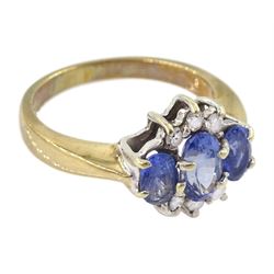 9ct gold three stone oval sapphire and round brilliant cut diamond cluster ring