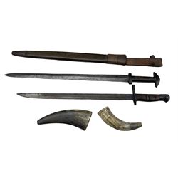 Two horn powder flasks, Eastern short sword with horn hilt, blade length 48cm and a Remington bayonet dated 1917 with a leather scabbard