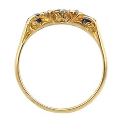Edwardian 18ct gold three stone sapphire ring, with four diamond accents set between, makers mark S.U, Chester 1902, total sapphire weight approx 0.90 carat, boxed