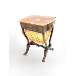 Regency mahogany work table, rectangular top with bowed sides with cross banded and box wood stringing, above drawer and faux drawer featuring lion mask pull handles, and silk covered sliding box, shaped uprights and four splayed supports terminating in brass hairy paw castors (W54cm, D45cm, H71cm)