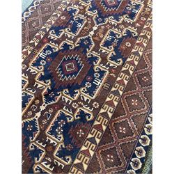 Afghan rug with geometric design and borders together (200cm x 105cm) together with a Hamadan rug (212cm x 110cm)