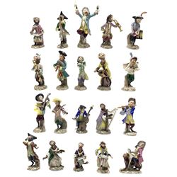 20th century Volkstedt porcelain twenty-piece Monkey Orchestra or Band, including a Conductor, Harpist, Flautist, Violinist, Signers etc, each dressed in elaborate rococo clothing, the male monkeys take on the roles of the musicians, while the female monkeys are portrayed as singers, max H15.5cm