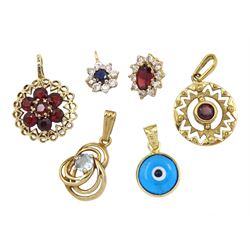 Five 9ct gold stone set pendants including sapphire and garnet and a 14ct gold glass pendant