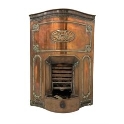Early 20th century Adams design copper freestanding fireplace, serpentine front with pierced fretwork frieze, moulded reeded borders and shell decoration to the front