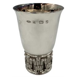 Silver cup of tapering form, the base formed as Prince of Wales feathers and engraved with initials H10cm Birmingham 1981 Maker Albert Edward Jones