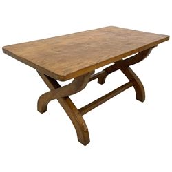 Rabbitman - oak coffee table, rectangular adzed top on curved x-framed supports, carved with rabbit signature, by Peter Heap, Wetwang