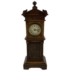 Early 20th century miniature longcase clock, dial bearing Roman Numerals, the case with arched pediment, and carved panel to the trunk, H30.5cm 