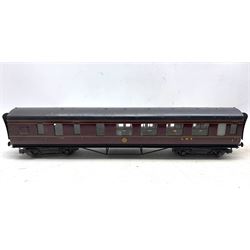 Four Exley O gauge corridor coaches in LMS crimson livery and yellow lettering comprising 2237, 6444, 3222 and 1555 together with track and accessories etc