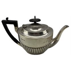 Edwardian silver oval teapot with half body reeded decoration, ebonised handle and lift Sheffield 1904 Maker Walker & Hall