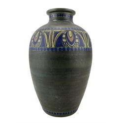 Continental pottery vase, probably Gouda, of ovoid form, painted with geometric banding, retailed by Liberty, H30cm 