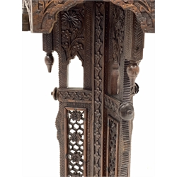 Early 20th century Indian carved table, profusely pierced and carved with flowers and foliage, D36cm, H76cm