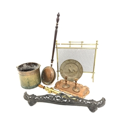 Arts & Crafts copper tray of shaped rectangular form with embossed  details, L53cm, a pierced cast iron fire fender, brass fire screen, pair of Adams style Old Sheffield plate candlesticks, riveted brass swing handled coal bucket and other metal wares