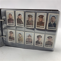 An album of military and sport related cigarette cards, part sets including Turf Cricketers, Gallaher V.C. Heroes, Players Decorations and Medals, Sporting Trophies etc (approx 300+ cards)